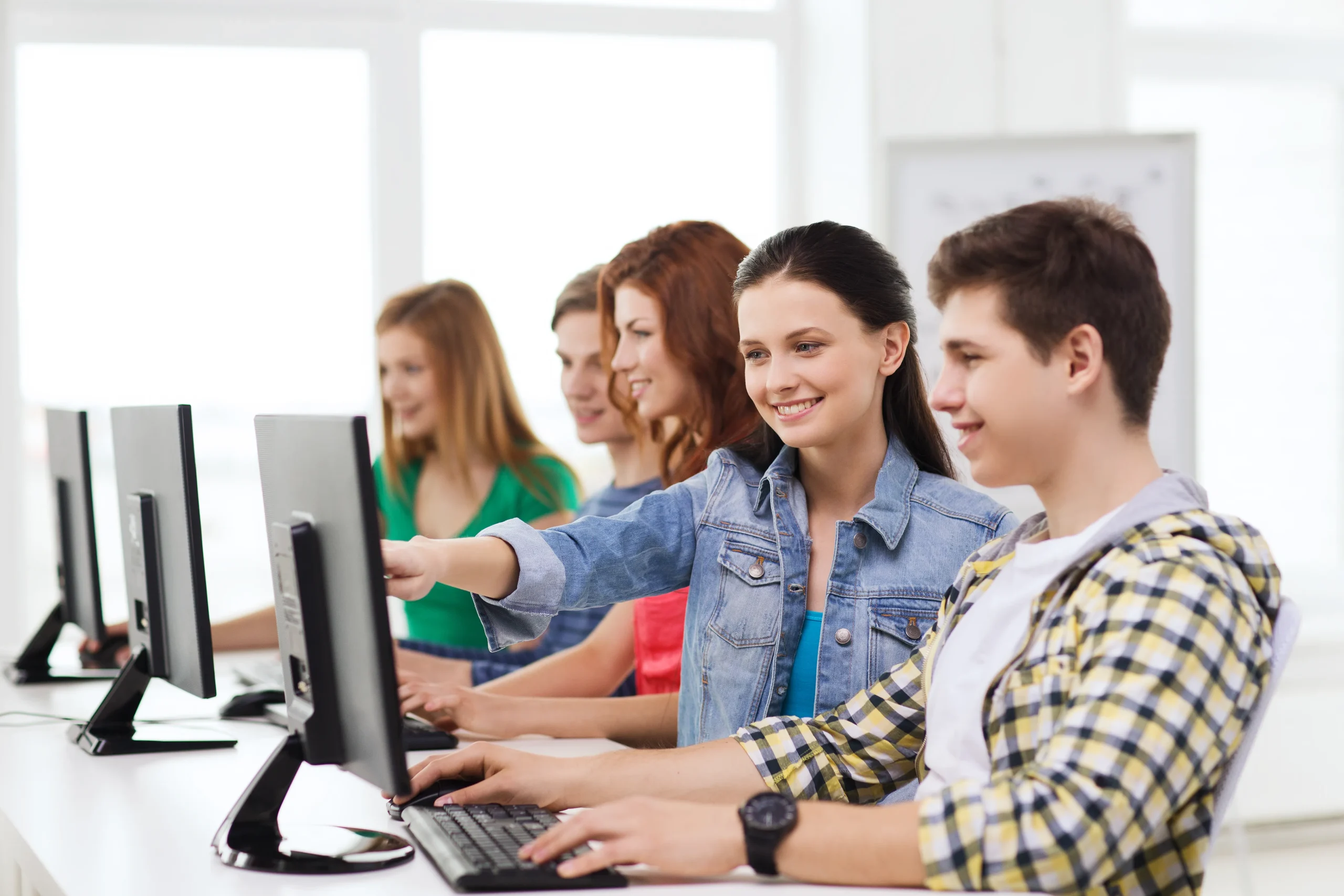 education technology friendship school concept smiling male student with classmates computer class zon